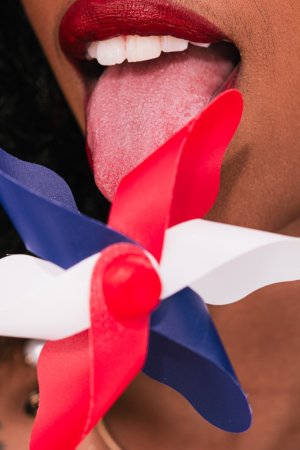 Mia Love in red white blue bikini posing with American flag photo 21