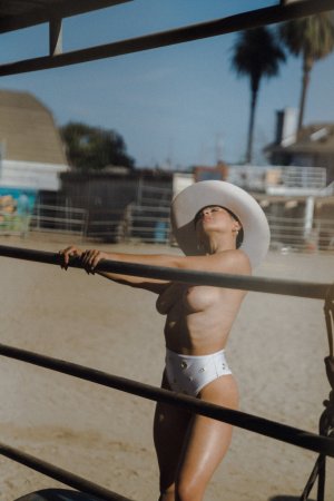 Drew Catherine Willa Prescott nude on rocks in cowboy boots photo 18