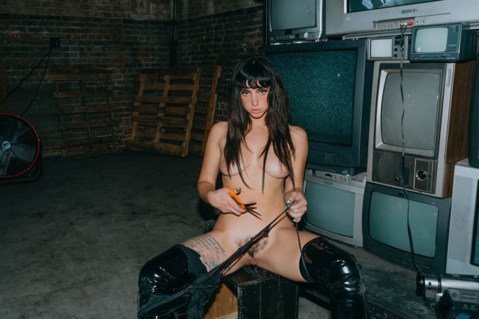 Chloe Crawford and Reed posing nude in leather and feathers photo 18