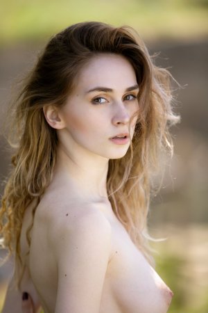 Yana West in lingerie against palm trees then strips photo 18