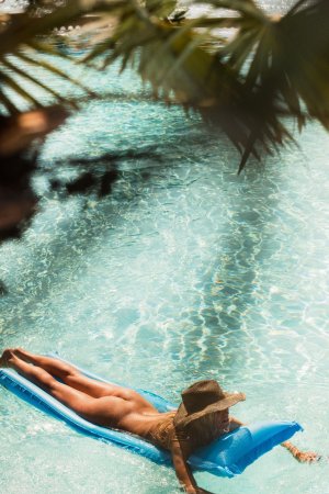 Alberte Valentine poolside in wet hair and bikini bottoms only photo 2