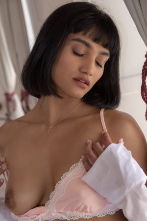 Angel Constance teasing in silk pajamas in Morocco bedroom photo 1