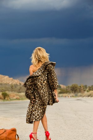 Dani Mathers nude in leopard coat and red heels by vintage car photo 4